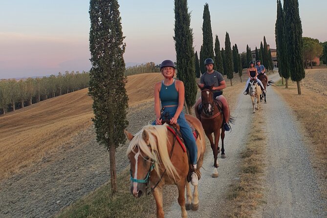 Adventure on horseback in the Tuscan countryside - Riding through the hills outside Siena