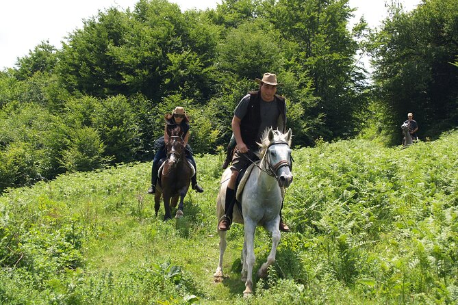 Balkan Horse Riding - Glozhene Monastery Ride - Arriving at Glozhene Monastery on horseback