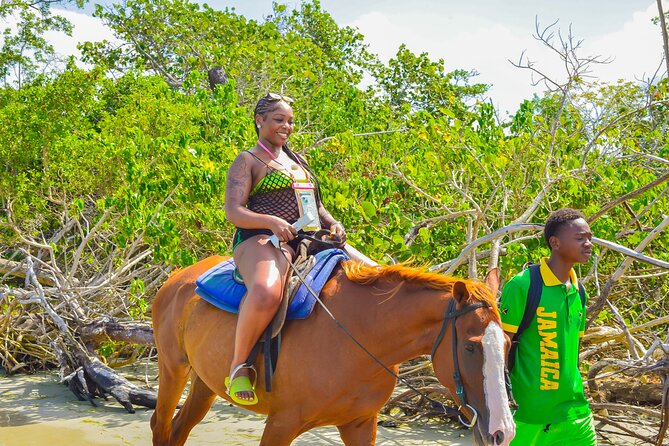 Bamboo Rafting and Horseback Riding Tour Montego Bay Jamaica - Booking, cancellation, and the communication warning