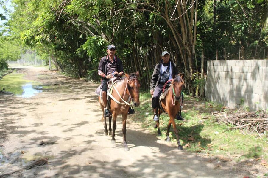 Beach horse back riding with countryside - Riding toward Maimón Bay
