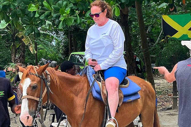 Blue Hole, River Tubing, and Horse Ride with Swim Ocho Rios - Bamboo rafting at a slower pace