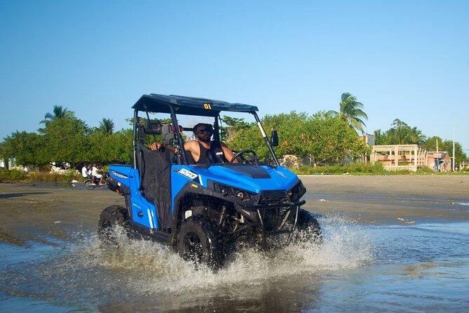 Cartagena ATV Buggy and Horseback riding Beach and Barrio Tour - Crossing La Cienega by local bridge