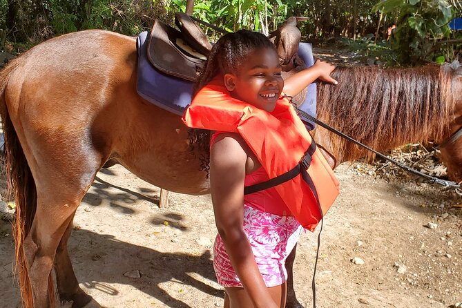 Dunn's River Falls Climb, Zipline and Horseback Riding Private Tour - Ziplining above the Jamaican canopy