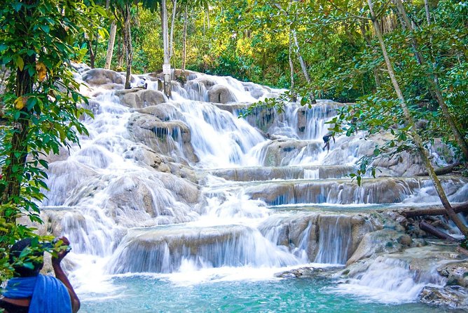 Dunn's River Falls, River Tubing, and Horseback Riding With Transportation - Dunn’s River Falls starts the day with wet stone steps