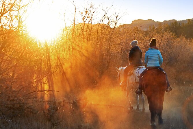 East Zion Checkerboard Evening Shadow Horseback Ride - Riding toward sunset from Zion Ponderosa Ranch Resort