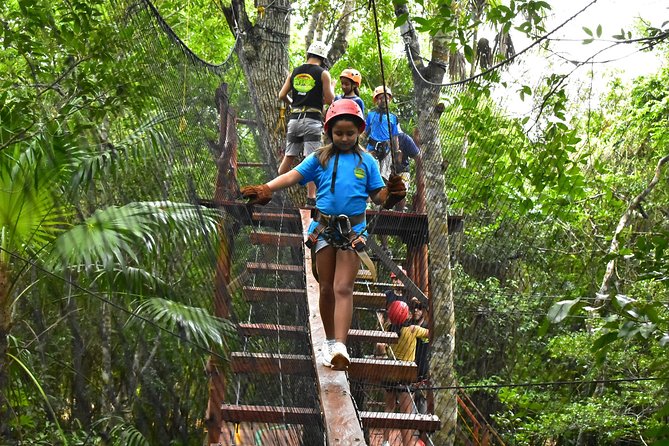 Extreme Horses Adventure with ATV, Ziplines & Cenote - ATV riding on dusty jungle trails