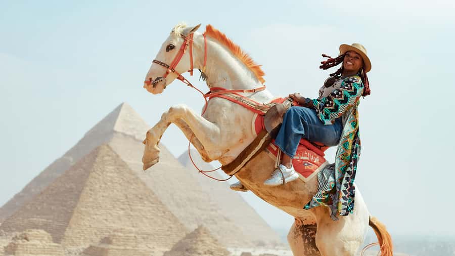 From Cairo: Camel or Horse Ride Tour Around Giza Pyramids - Riding toward the Giza pyramids