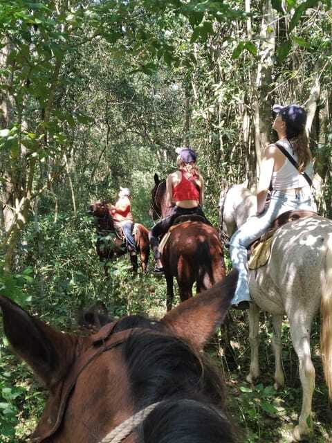 Group horseback ride on Holbox Island, Quintana Roo - The guides and the feel of a small family business