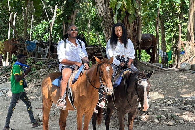 Horseback Riding Adventure in Jamaica - Getting comfortable before the horse enters the sea