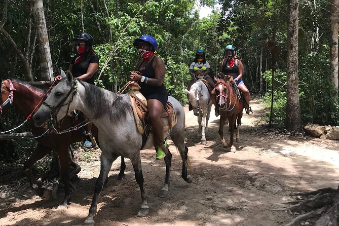 Horseback riding with ATV, zip lines and cenote, lunch and transfer - A rough ATV ride through the jungle