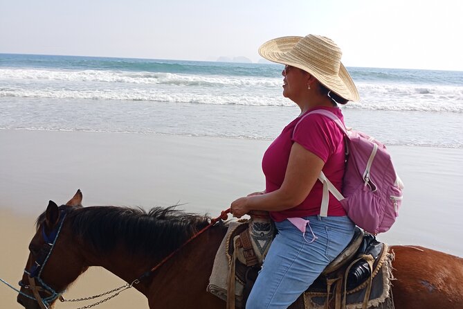Horseback Riding Zihuatanejo - Bahia de Zihuatanejo links the beaches together