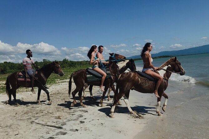 Horseback “SPECIAL”- Negril’s Beach Ride N’ Swim with Free photos/videos - Changing saddles before the ocean ride