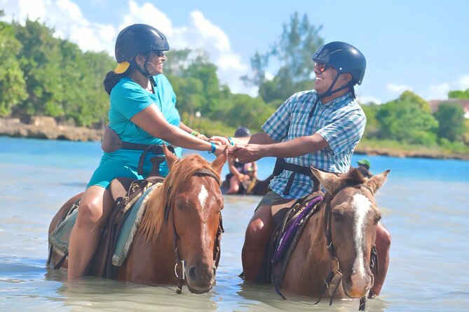 Negril 45-minute Guided Horseback Ride and Swim - Riding from rural Jamaica into the sea