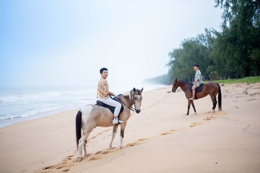 Phuket: Kamala Beach Horse Riding Activity - Riding beneath Kamala’s coconut trees