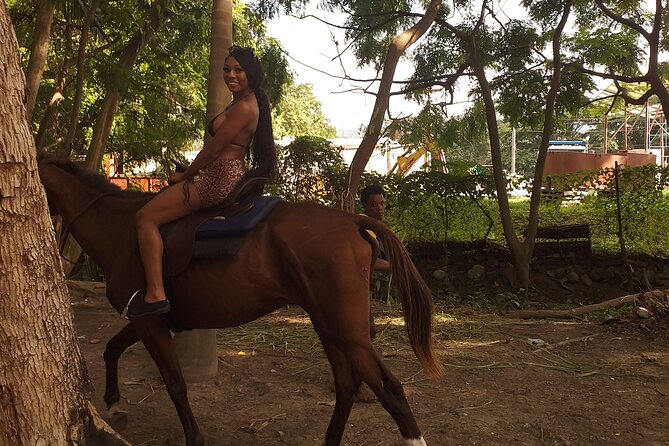 Private & Customize Tour to Martha Brae Rafting and Horseback Riding N Swim - What the bamboo rafting stop offers