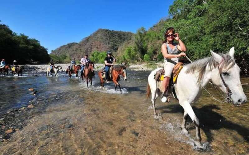 Puerto Escondido: Sunset Horse Back Riding Tour - Leaving Puerto Escondido for San José Manialtepec