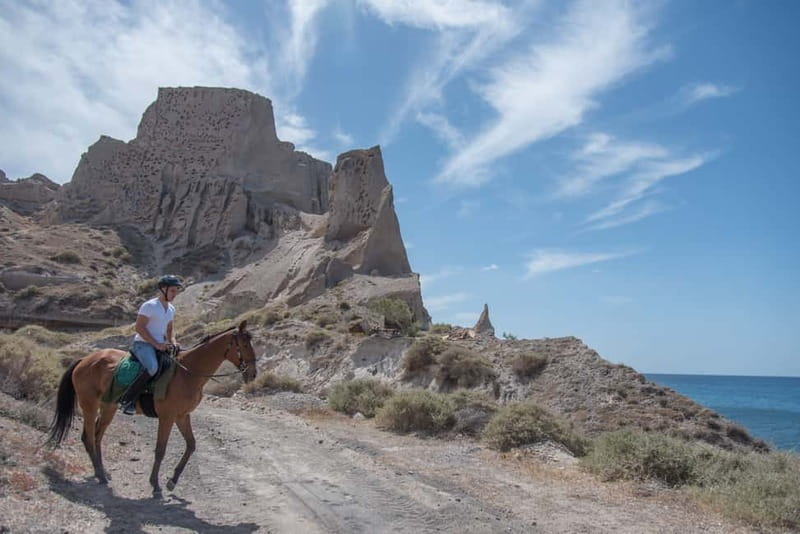 Santorini: Horse Riding Trip to Black Sandy Beach - Riding Santorini beyond the postcard views