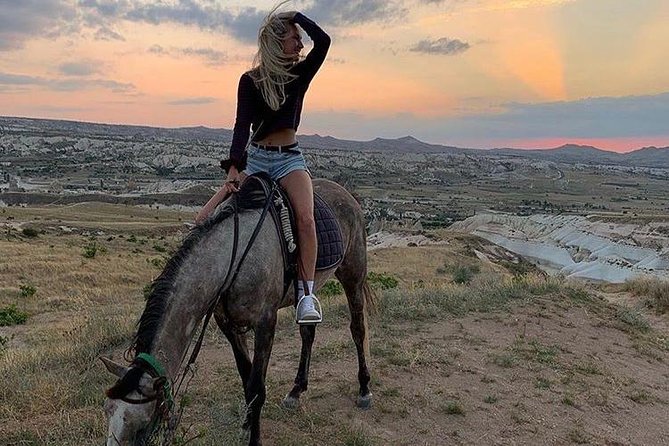 Sunset Horsebackriding-Tour through the Valleys of Cappadocia - Red Valley and the climb toward Cross Church Cafe