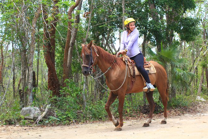 Tulum Ruins Exploration and Horseback Riding and Cenote Adventure - Swimming in a cavern cenote