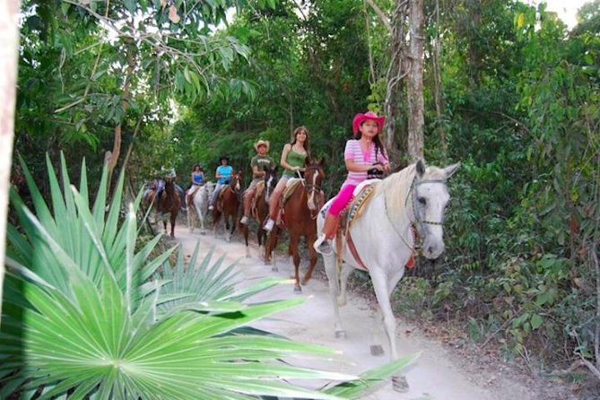 Ziplining and Horseback Riding Experience from Cancun and Playa del Carmen - Cooling off in a Yucatan cenote